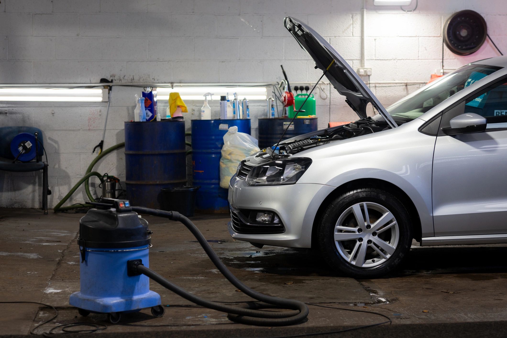 Car being serviced in a workshop